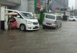 Ilustrasi genangan air di salah satu jalan di Jakarta - Foto: Istimewa